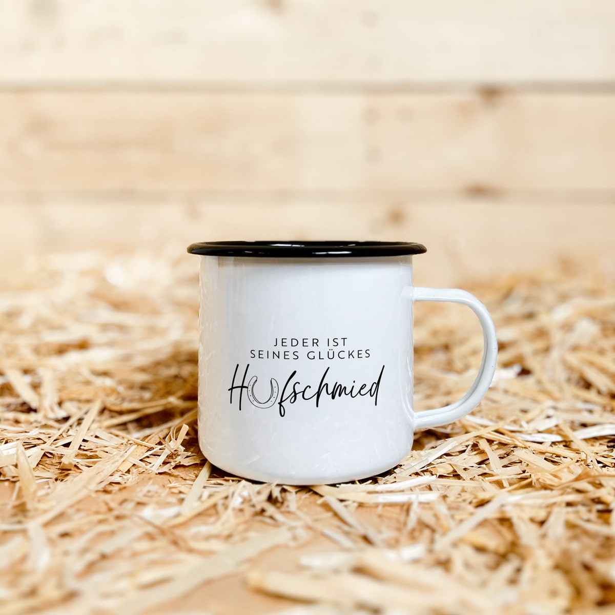 Emaille-Tasse "Jeder ist seines Glückes Hufschmied"